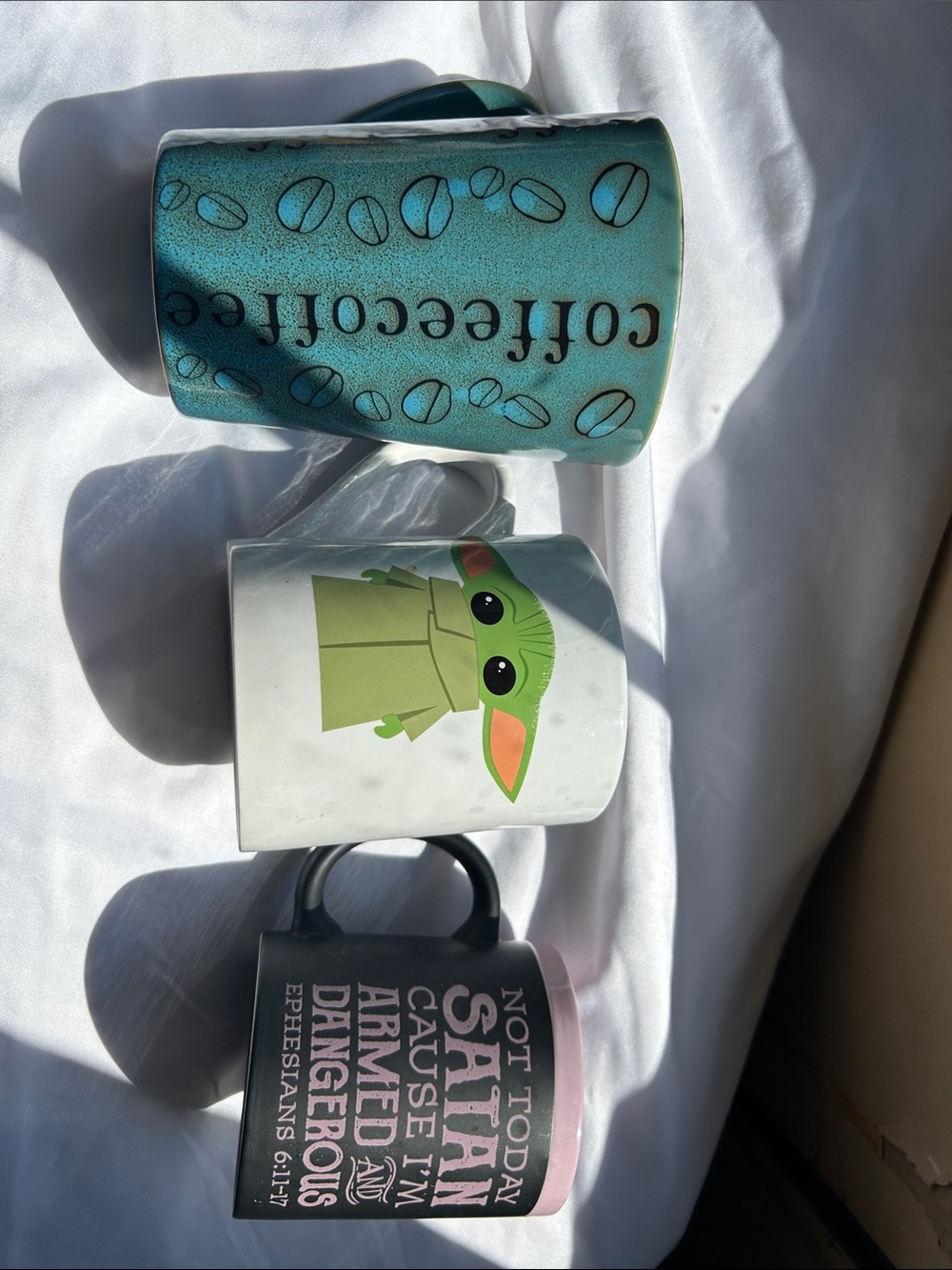 3 coffee cups. Grogu